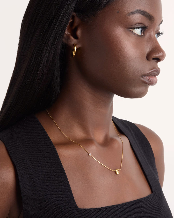 Small E Initial Cubic Zirconia Necklace in Gold