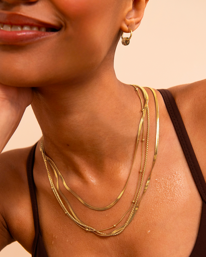 Charm Seamless Huggie Earrings in Gold