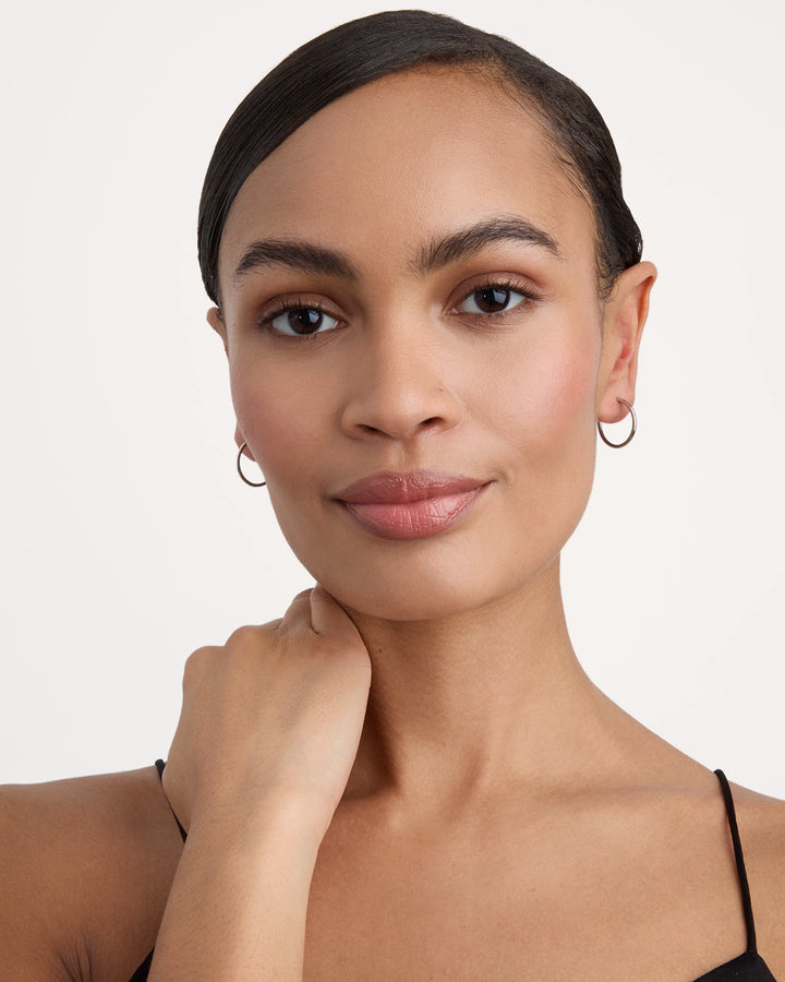 Thin Round Seamless Huggie Hoop Earrings in Silver