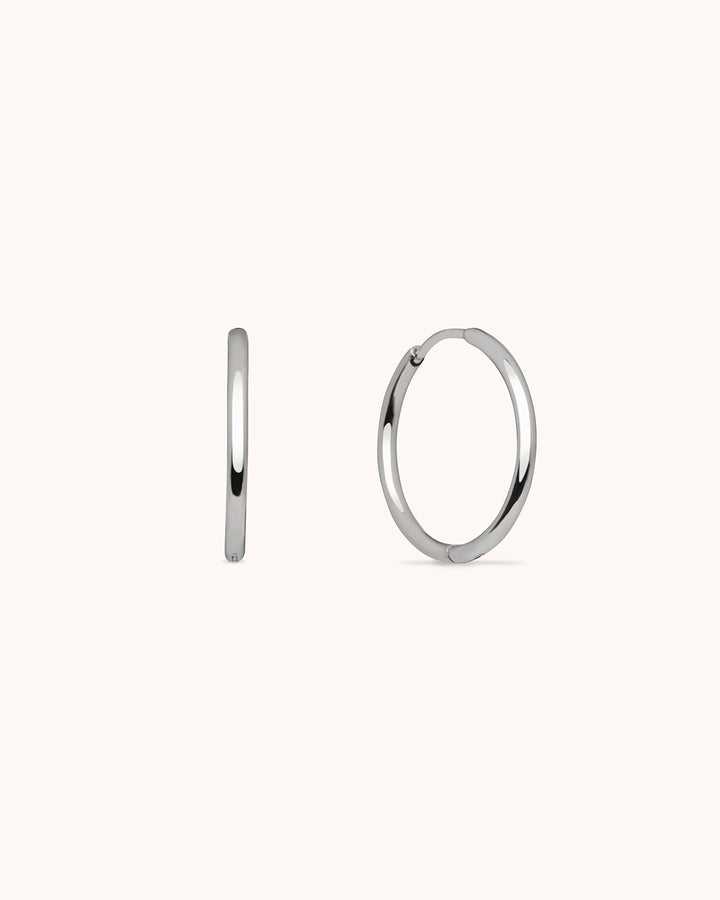 Thin Round Seamless Huggie Hoop Earrings in Silver