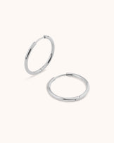 Round Seamless Huggie Hoop Earrings in Silver