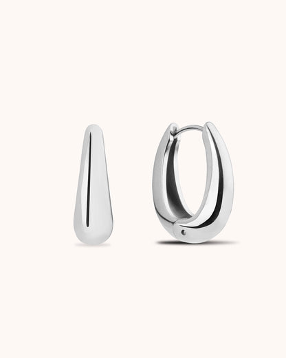 Thick Oval Seamless Huggie Earrings in Silver