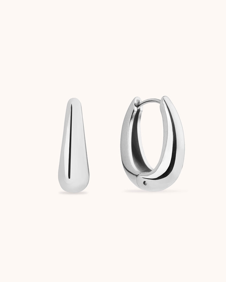 Thick Oval Seamless Huggie Earrings in Silver