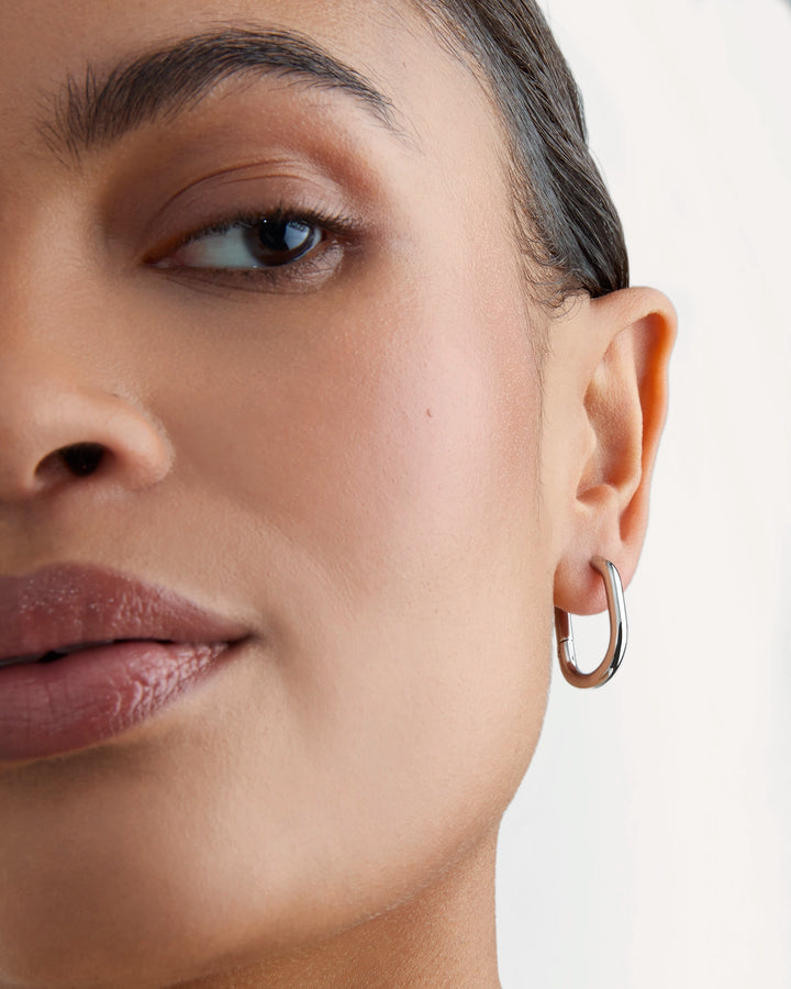 Long Circle Seamless Huggie Earrings in Silver