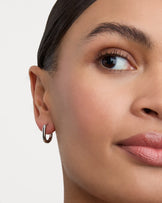 Thick Oval Seamless Huggie Hoop Earrings in Silver