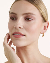 Thick Oval Hoop Earrings in Gold