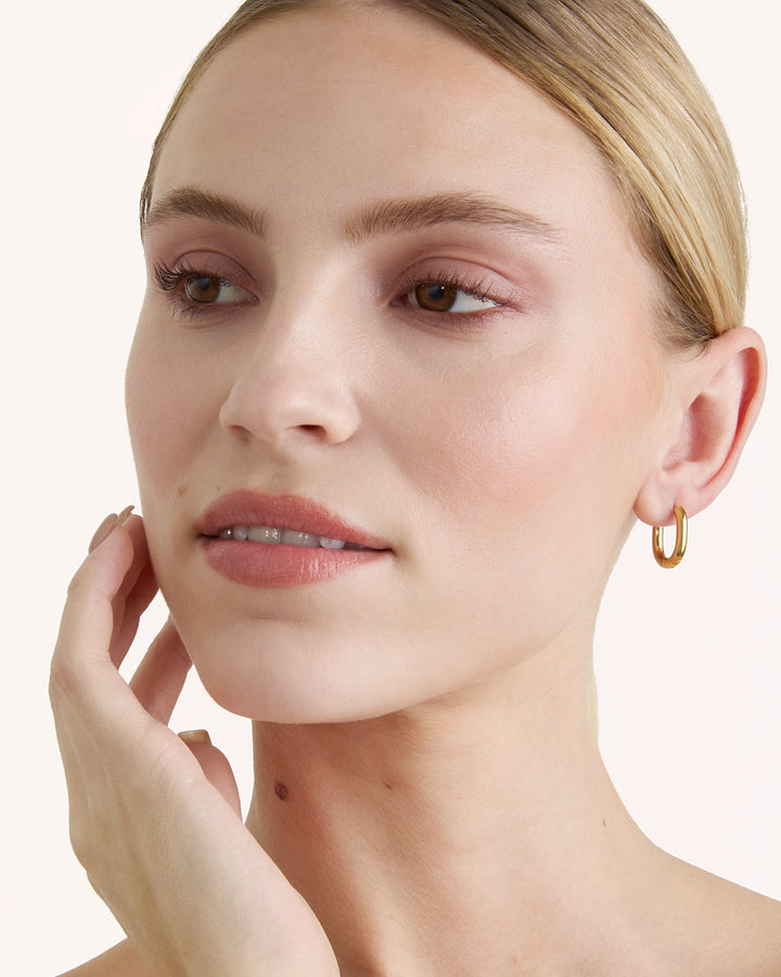 Thick Oval Hoop Earrings in Gold