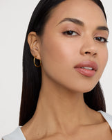 Waterproof Round Seamless Huggie Hoop Earrings in Gold