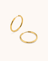 Waterproof Round Seamless Huggie Hoop Earrings in Gold