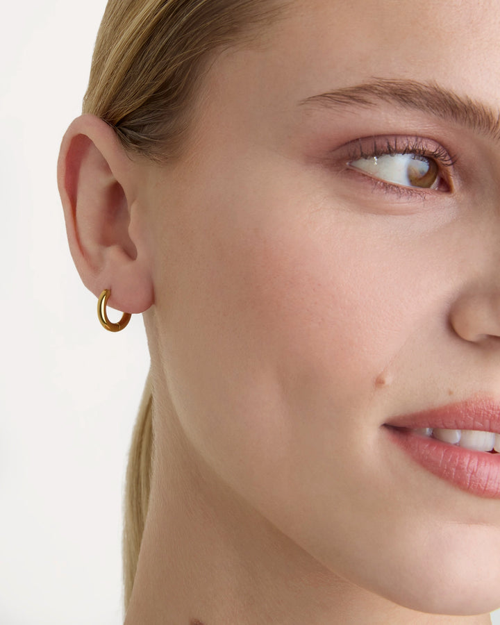 Waterproof Small Circle Seamless Huggie Hoop Earrings in Gold