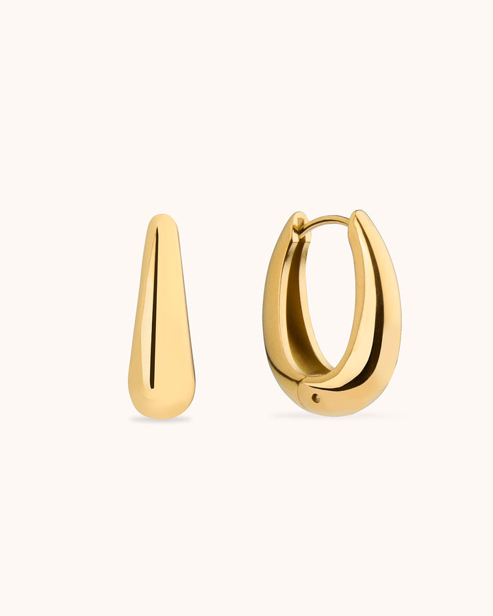 Thick Oval Seamless Huggie Earrings in Gold