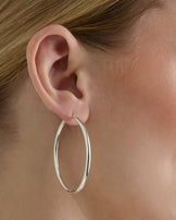 Thin Large Hoop Earrings in Silver