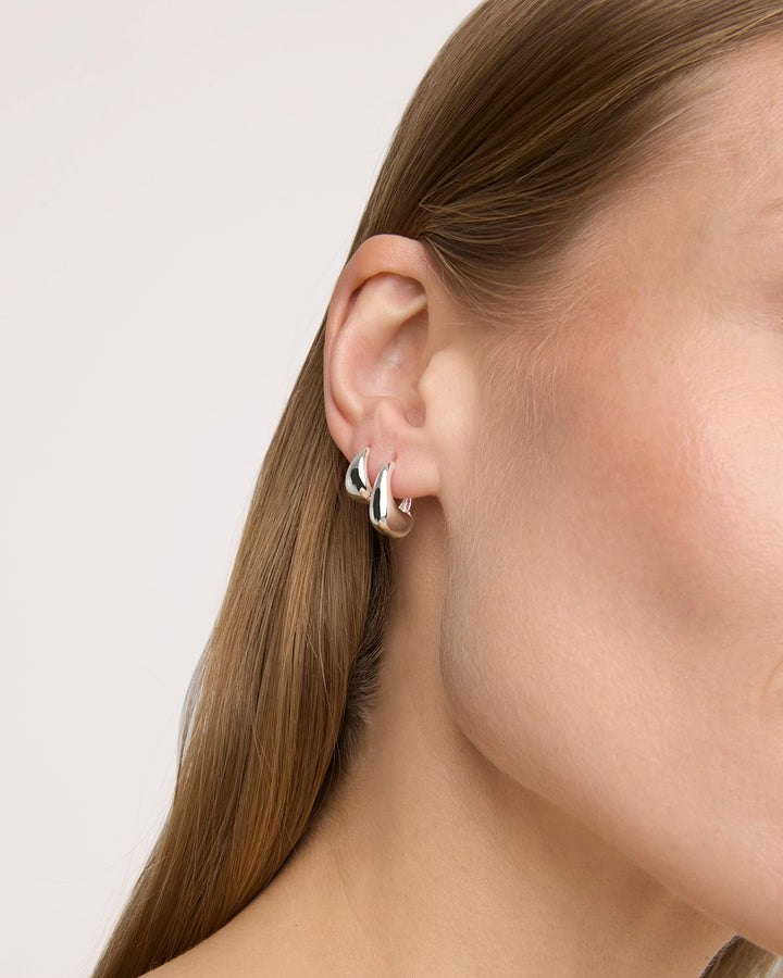 Oval Seamless Huggie Hoop Earrings in Silver