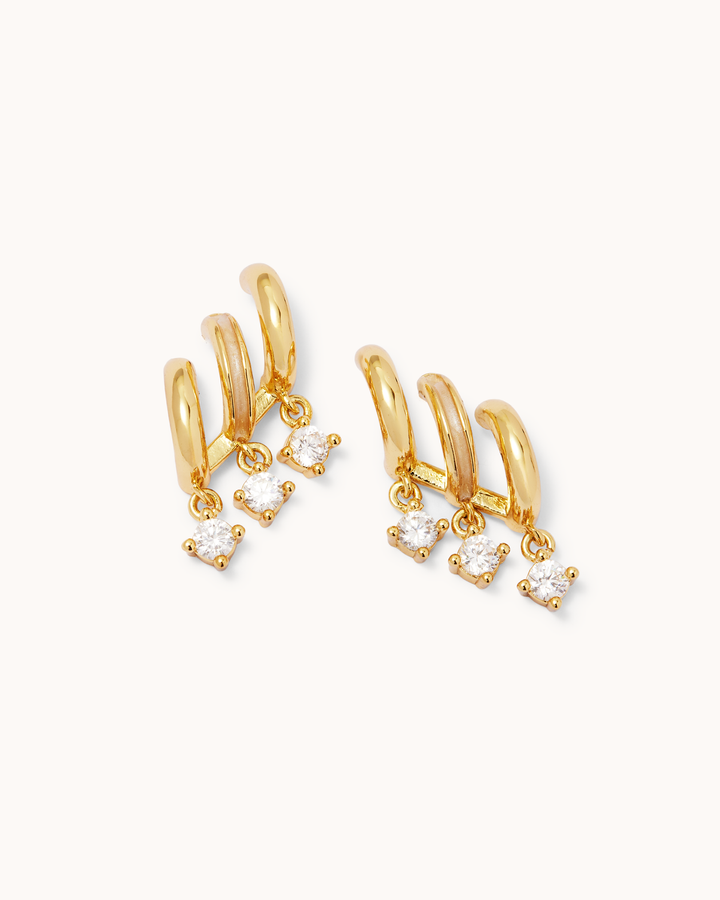 Triple Cubic Zirconia Drop Huggie Earrings in Gold